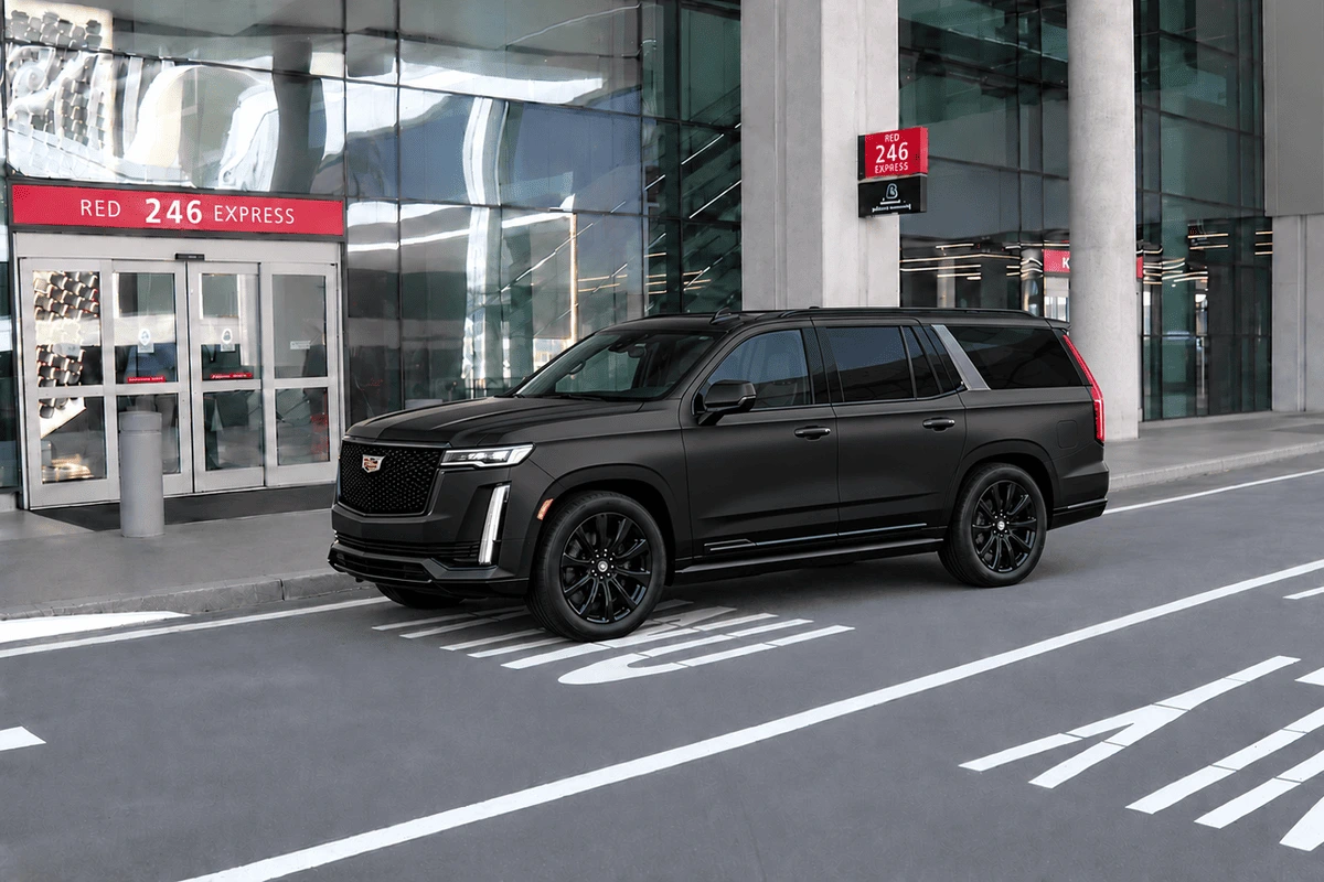 Black Escalade at Tampa International Airport Red Express Departures for private airport transportation.